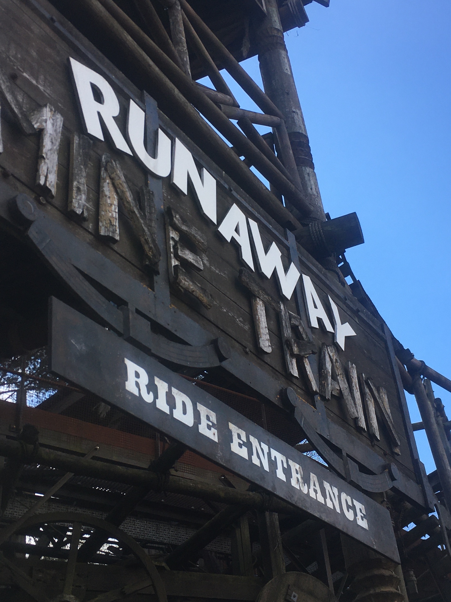 The Runaway Mine Train ride entrance sign in Katanga Canyon
