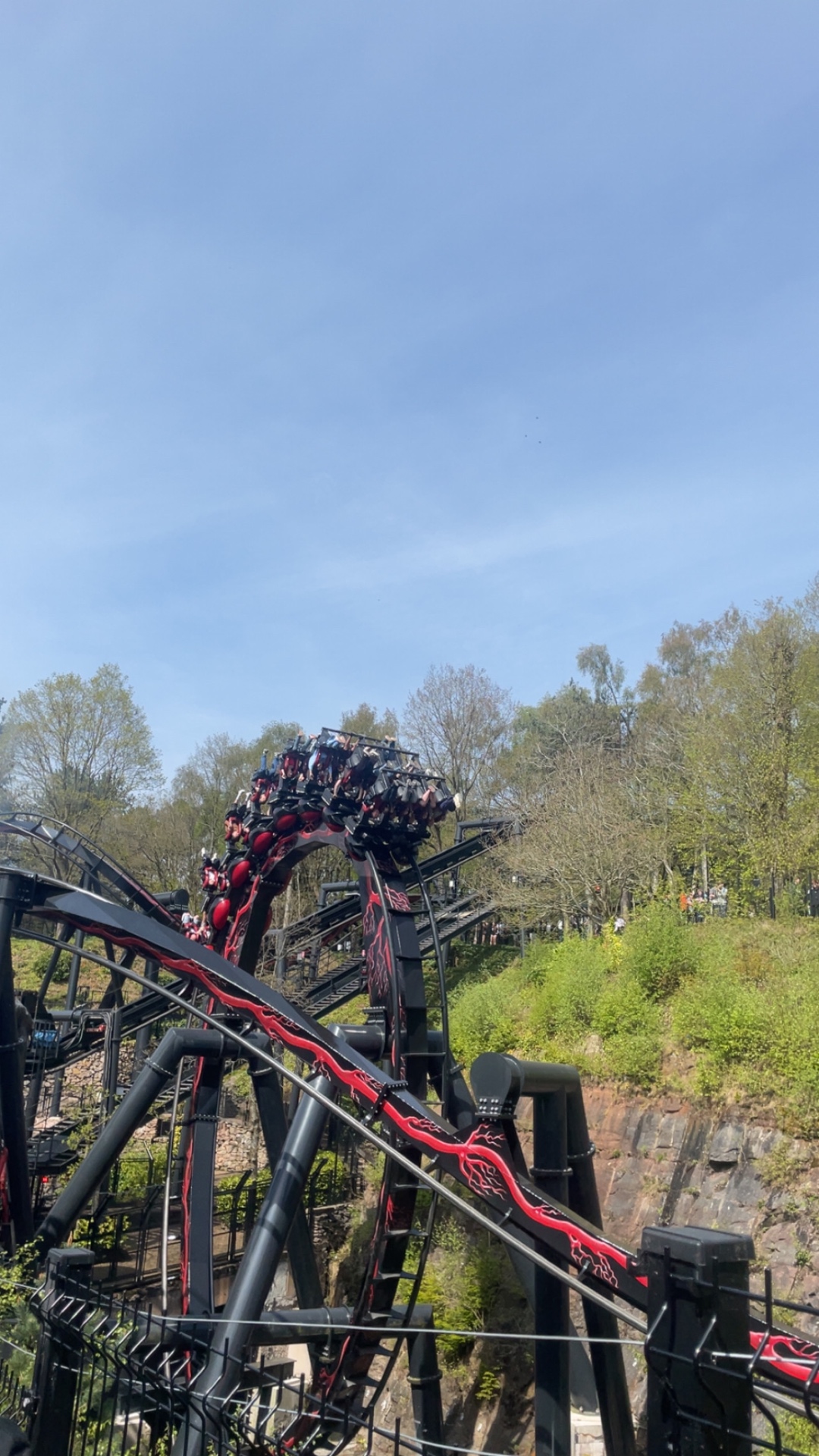 Nemesis Reborn train climbing through the Forbidden Valley quarry